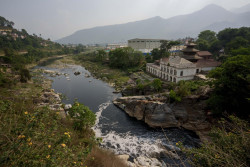 Nepal's holy Bagmati River choked with black sewage, trash