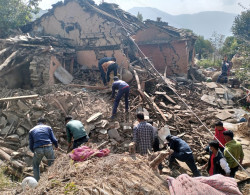 Red Cross helps build temporary dwellings for quake victims