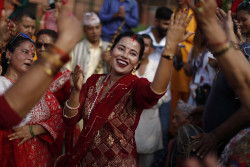 Sari-clad women sing, dance as they flock Shiva temples (Photo Gallery)