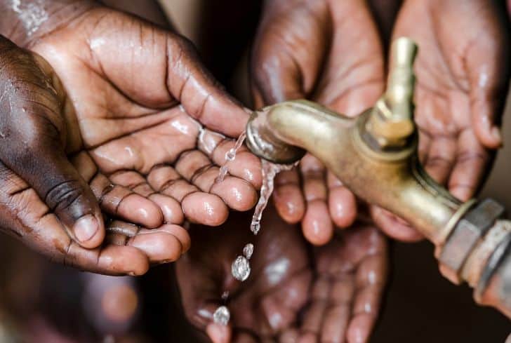 water-scarcity-children-washing-hands1679401462.jpg